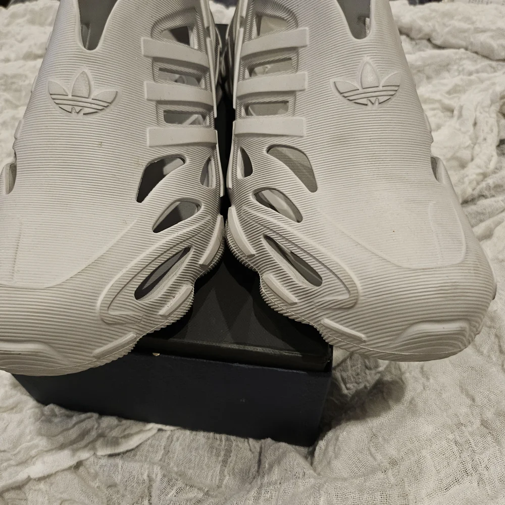 Adidas White Cut-Out Slip-On Shoes